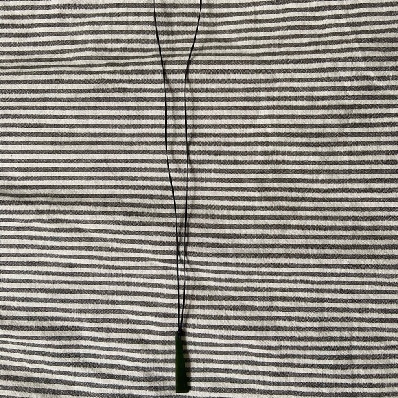 Green stone necklace with black adjustable cord. - Picture 2 of 2